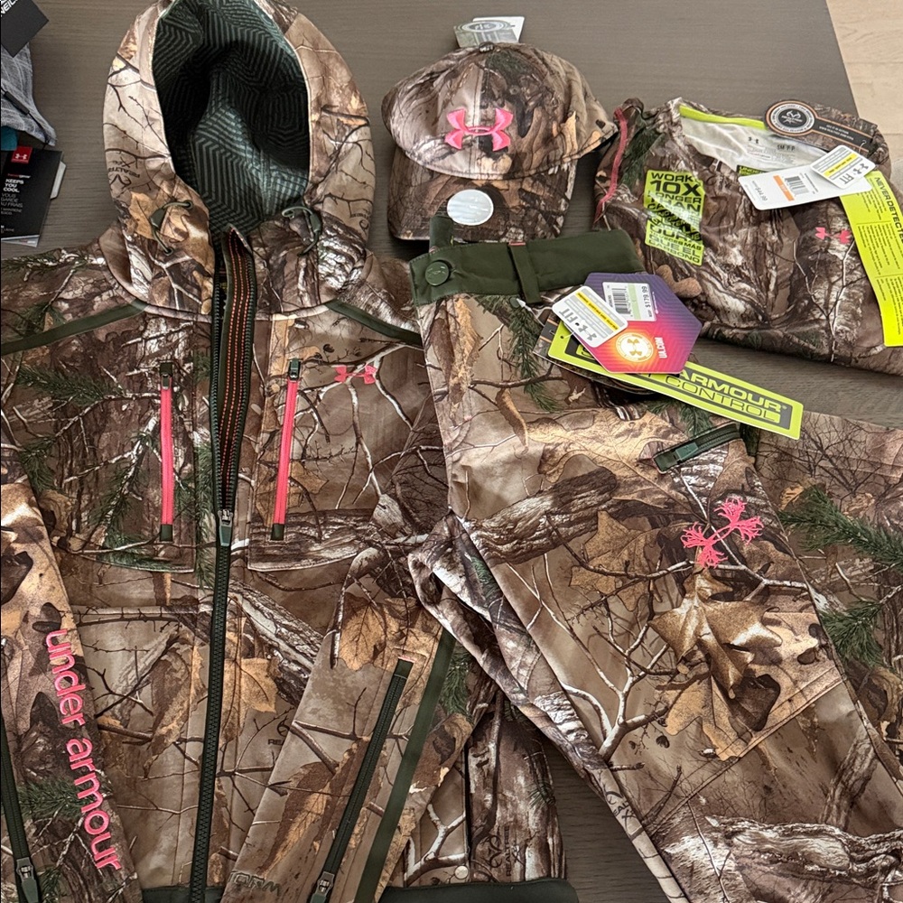 Under Armour hunting gear  
women’s jacket, pants, fleece long sleeve shirt, hat